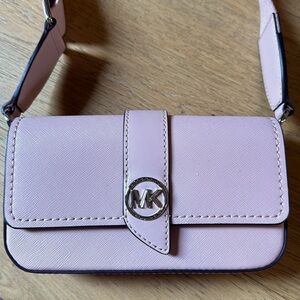 Brand new, never used Michael Kors purse.